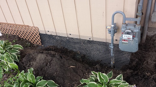 Ground exclusion of wire wrapped around home siding